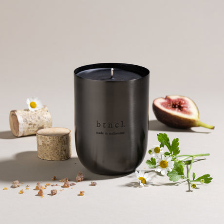Macedon black candle with fresh fig, birch bark and florals