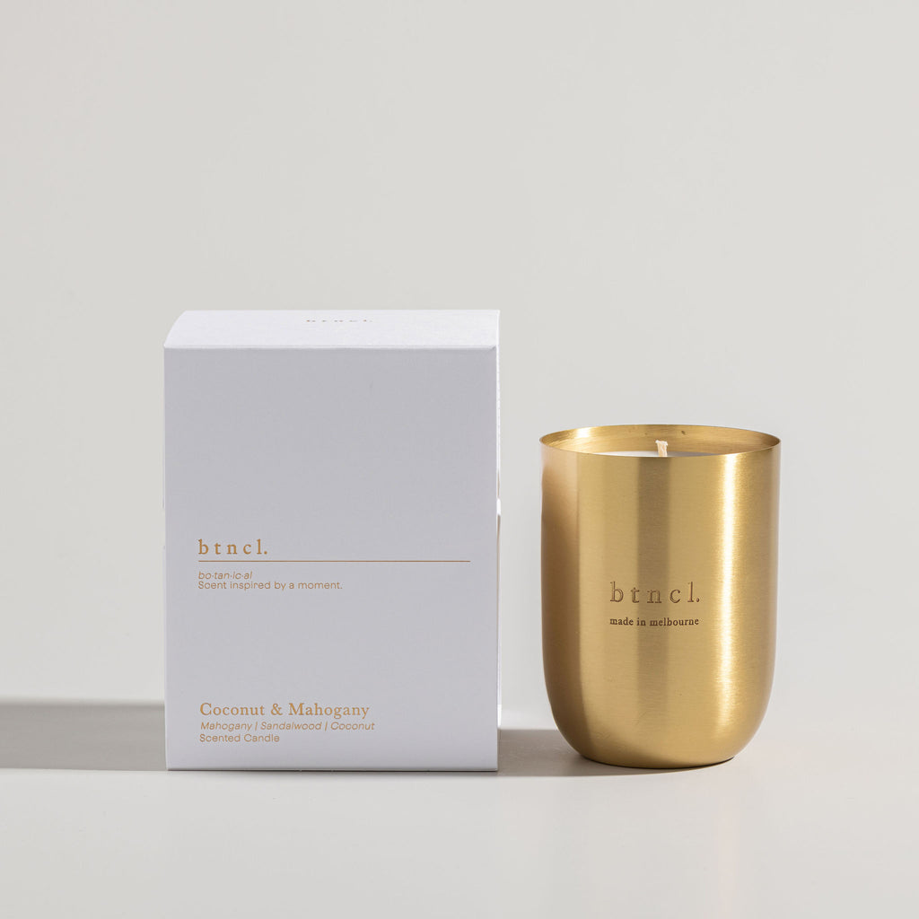 coconut mahogany candle with white packaging
