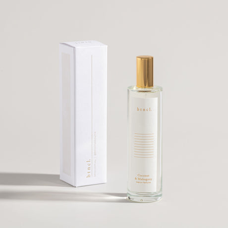 coconut mahogany perfume next to white box