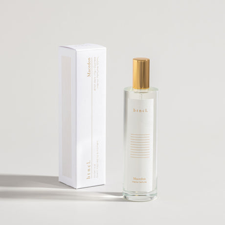 Macedon interior perfume next to while packaging